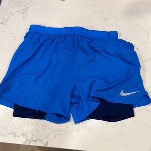 Bright Blue Nike dry fit running / training / workout shorts with compression
